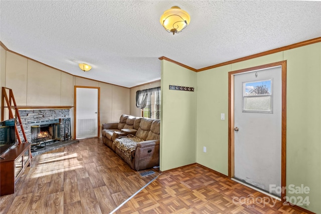 foyer with a fireplace, crown molding, a textured ceiling, and vaulted ceiling