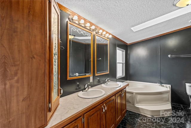 bathroom with vanity, a bath, crown molding, toilet, and a textured ceiling