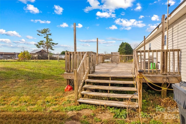 deck featuring a yard