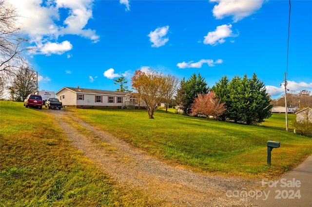 view of front of property with a front lawn