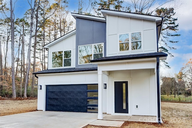 modern home featuring a garage