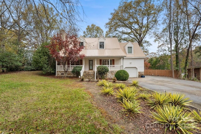 cape cod house with a front lawn and a porch