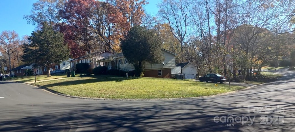 view of home's exterior featuring a yard