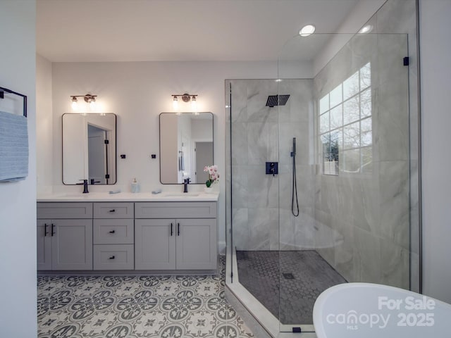 bathroom featuring vanity, tile patterned floors, and shower with separate bathtub