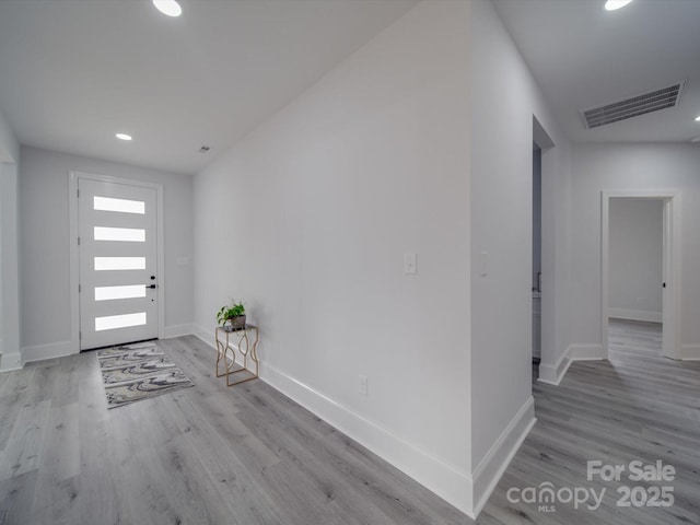 foyer entrance featuring light wood-type flooring