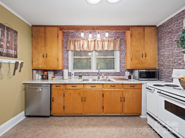 kitchen with light carpet, stainless steel appliances, crown molding, and sink