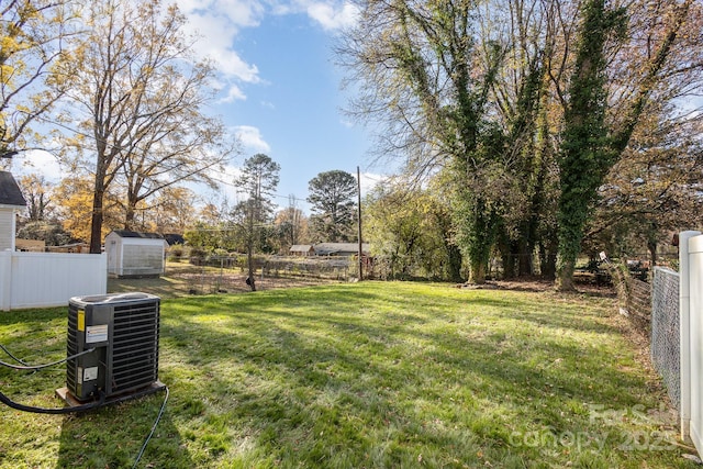 view of yard with central AC