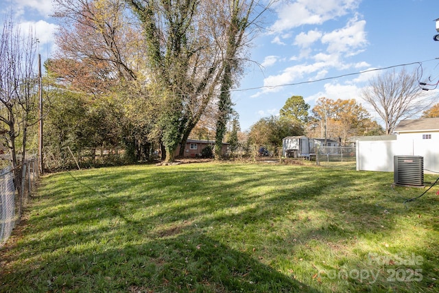 view of yard with central AC unit