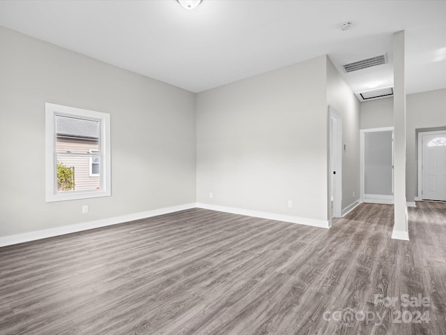 empty room featuring wood-type flooring