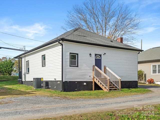 view of front of property with central AC unit