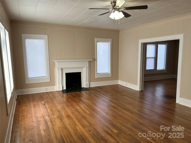 unfurnished living room featuring ornamental molding, dark hardwood / wood-style floors, and ceiling fan