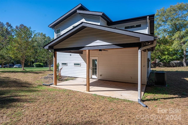 back of house with a yard, a patio, central AC, and ceiling fan