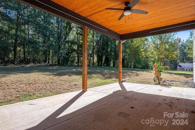 view of patio featuring ceiling fan