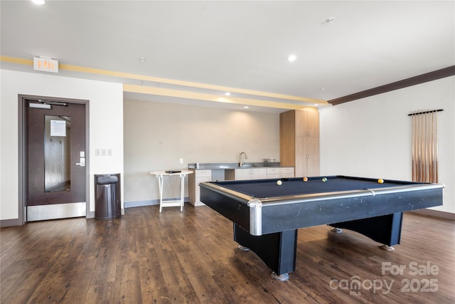 recreation room with sink, dark hardwood / wood-style flooring, ornamental molding, and pool table