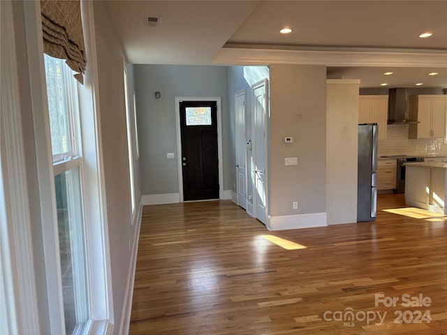 entrance foyer featuring hardwood / wood-style flooring