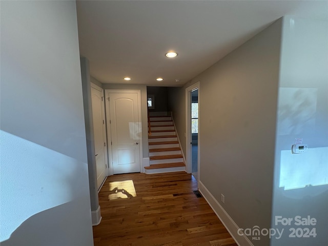 hallway featuring hardwood / wood-style flooring