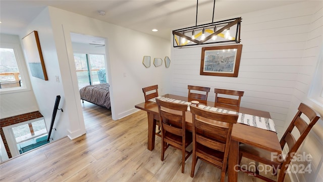 dining area with light hardwood / wood-style floors