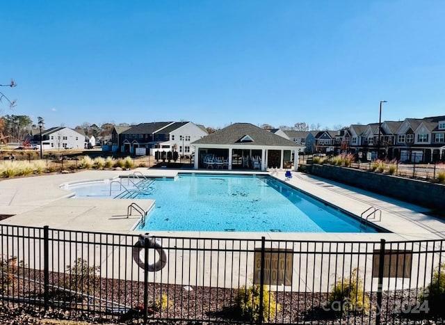 view of pool with a patio