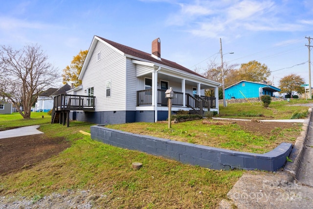 view of home's exterior with a lawn