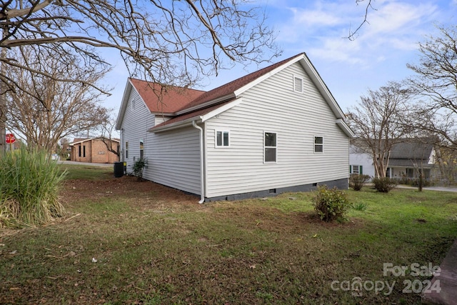 view of home's exterior featuring a lawn