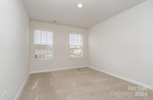 view of carpeted spare room