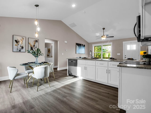 kitchen featuring ceiling fan, pendant lighting, dark wood-type flooring, white cabinetry, and stainless steel dishwasher