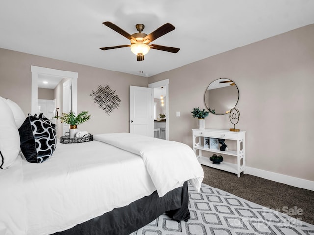 bedroom with ceiling fan and carpet