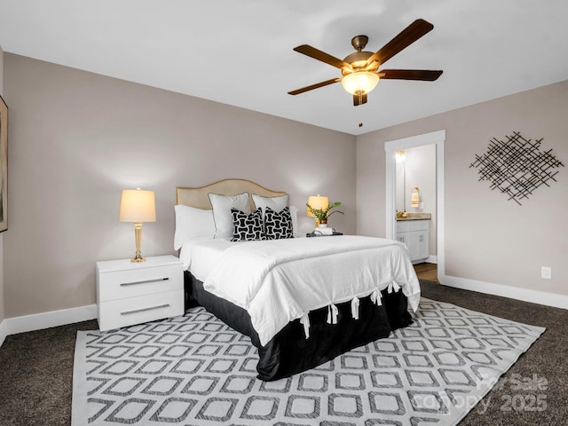 carpeted bedroom featuring ensuite bathroom and ceiling fan