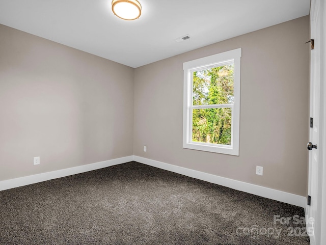 view of carpeted spare room