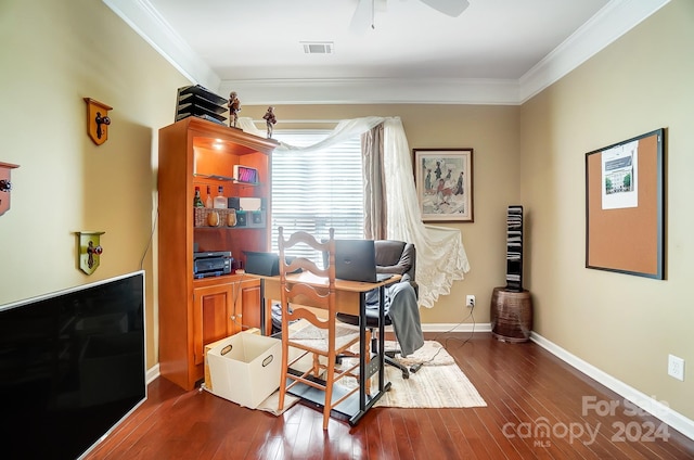 office featuring dark hardwood / wood-style floors, ceiling fan, and ornamental molding