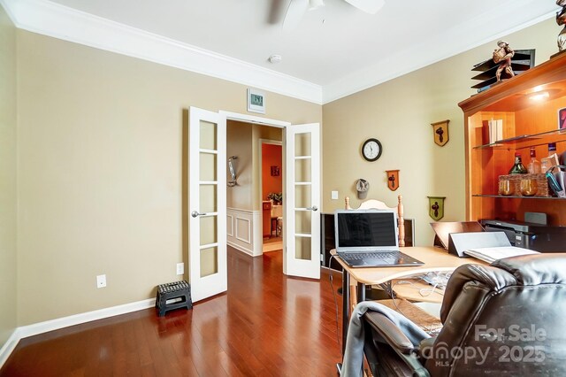 office featuring visible vents, ceiling fan, ornamental molding, french doors, and wood finished floors