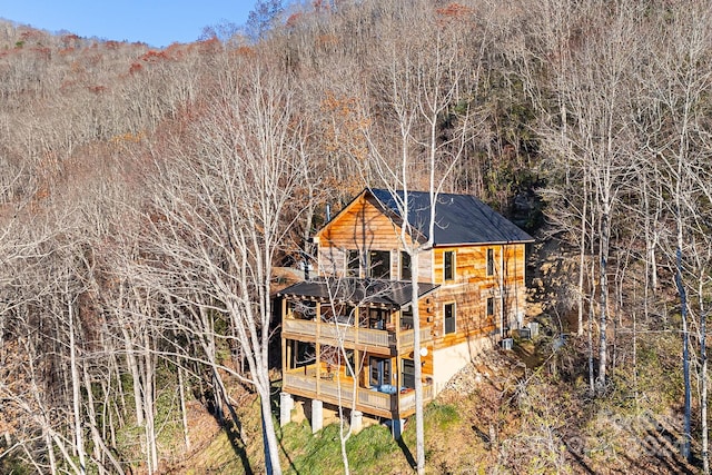 rear view of house with a deck