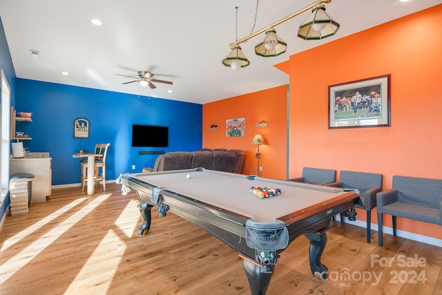 game room with ceiling fan, light wood-type flooring, and billiards