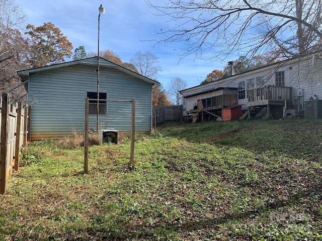 view of property exterior with a lawn