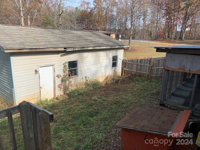 view of home's exterior with a lawn