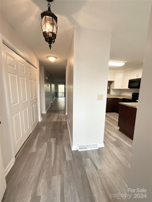 hall featuring light wood-type flooring