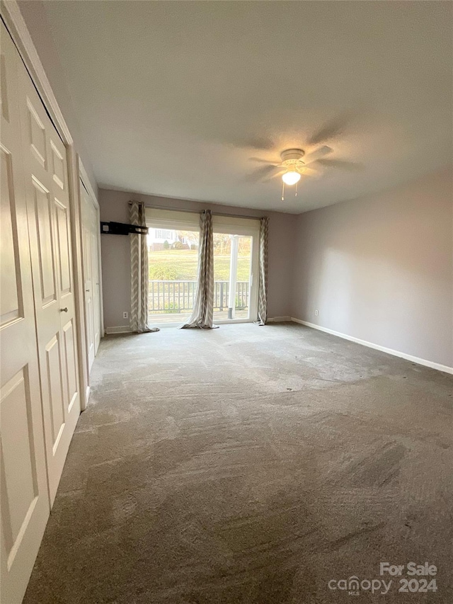 spare room featuring carpet floors