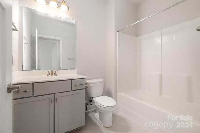 full bathroom with tile patterned flooring, vanity, toilet, and shower / washtub combination