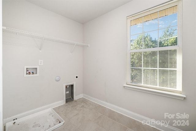 laundry room with washer hookup, hookup for a gas dryer, and electric dryer hookup