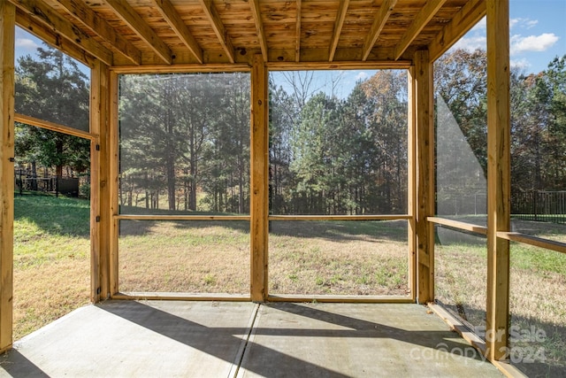 unfurnished sunroom with a wealth of natural light