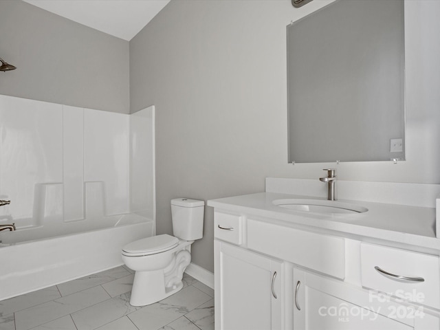 full bathroom with washtub / shower combination, vanity, and toilet