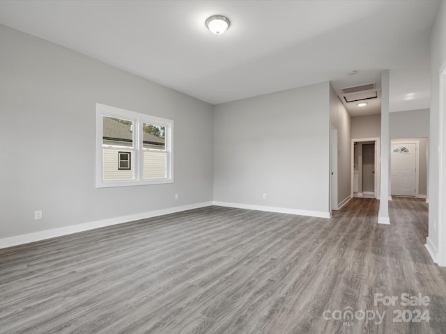 spare room with light hardwood / wood-style flooring