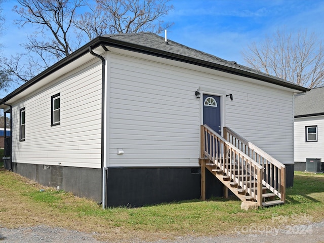 exterior space with central air condition unit