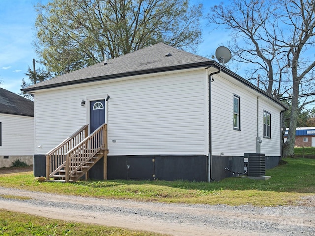 view of front of property with central air condition unit