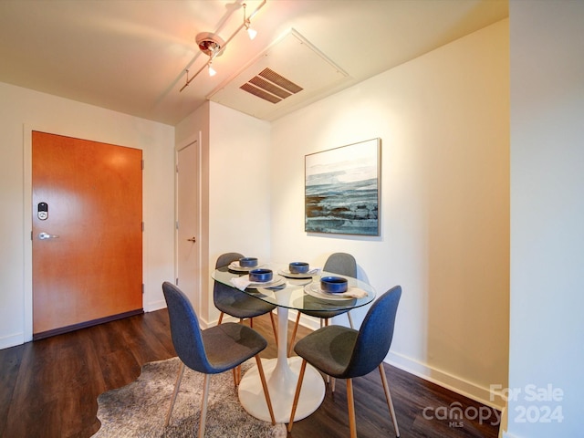 dining room featuring dark hardwood / wood-style floors