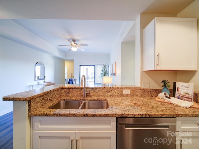 kitchen with dishwasher, sink, white cabinets, and dark hardwood / wood-style floors