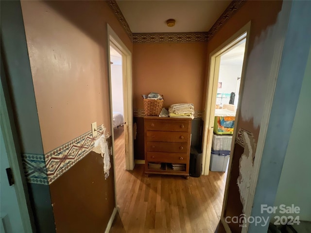 corridor featuring light hardwood / wood-style flooring