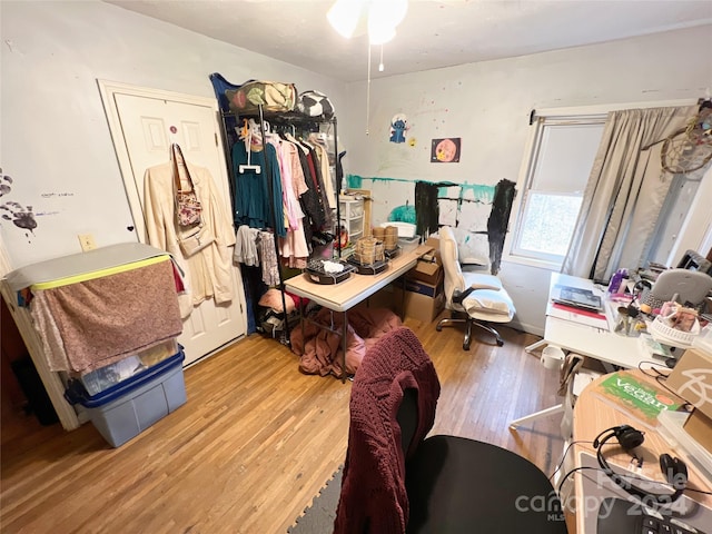 miscellaneous room featuring wood-type flooring