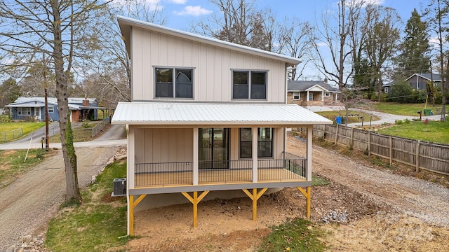 back of house with covered porch