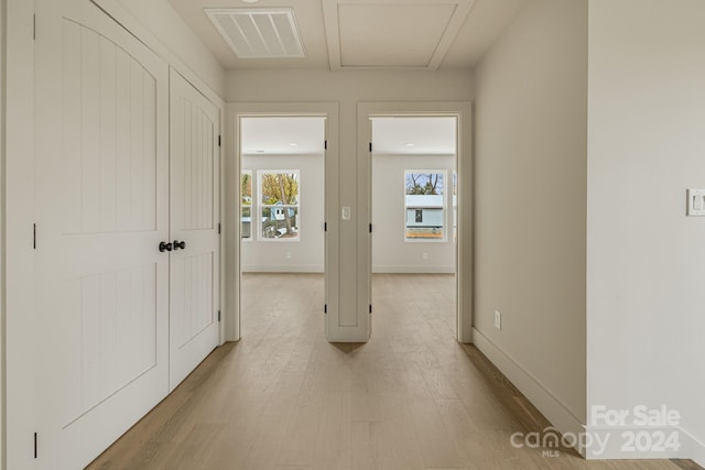 corridor featuring light wood-type flooring